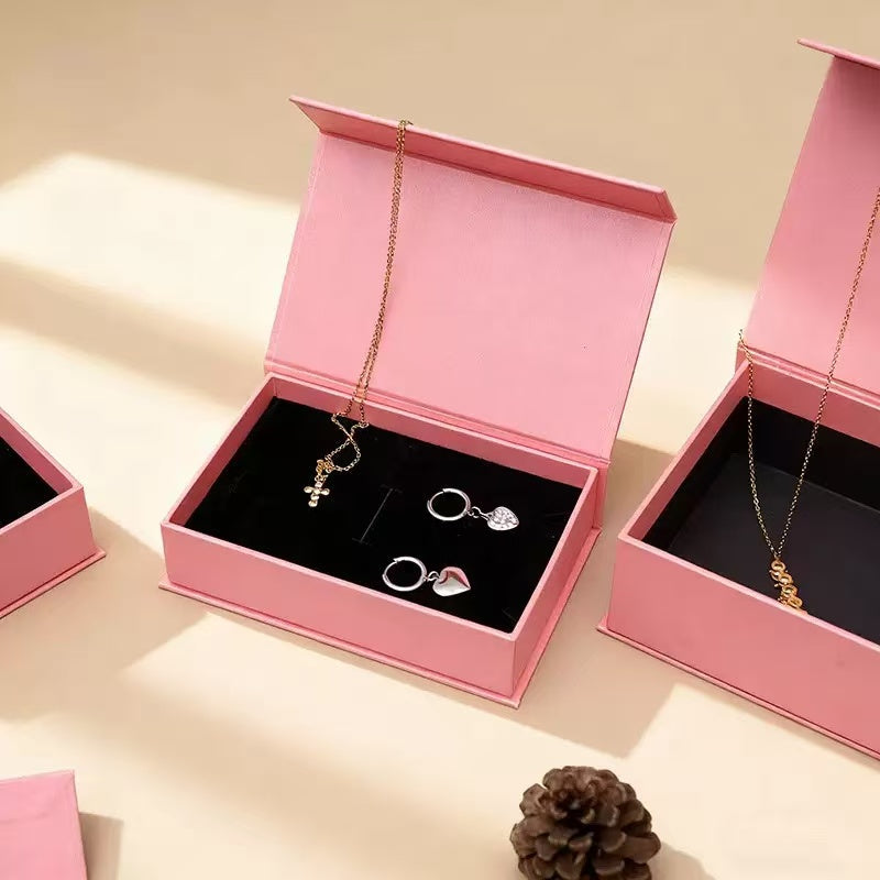 Closed book-style magnetic rigid gift box showing the hinged structure