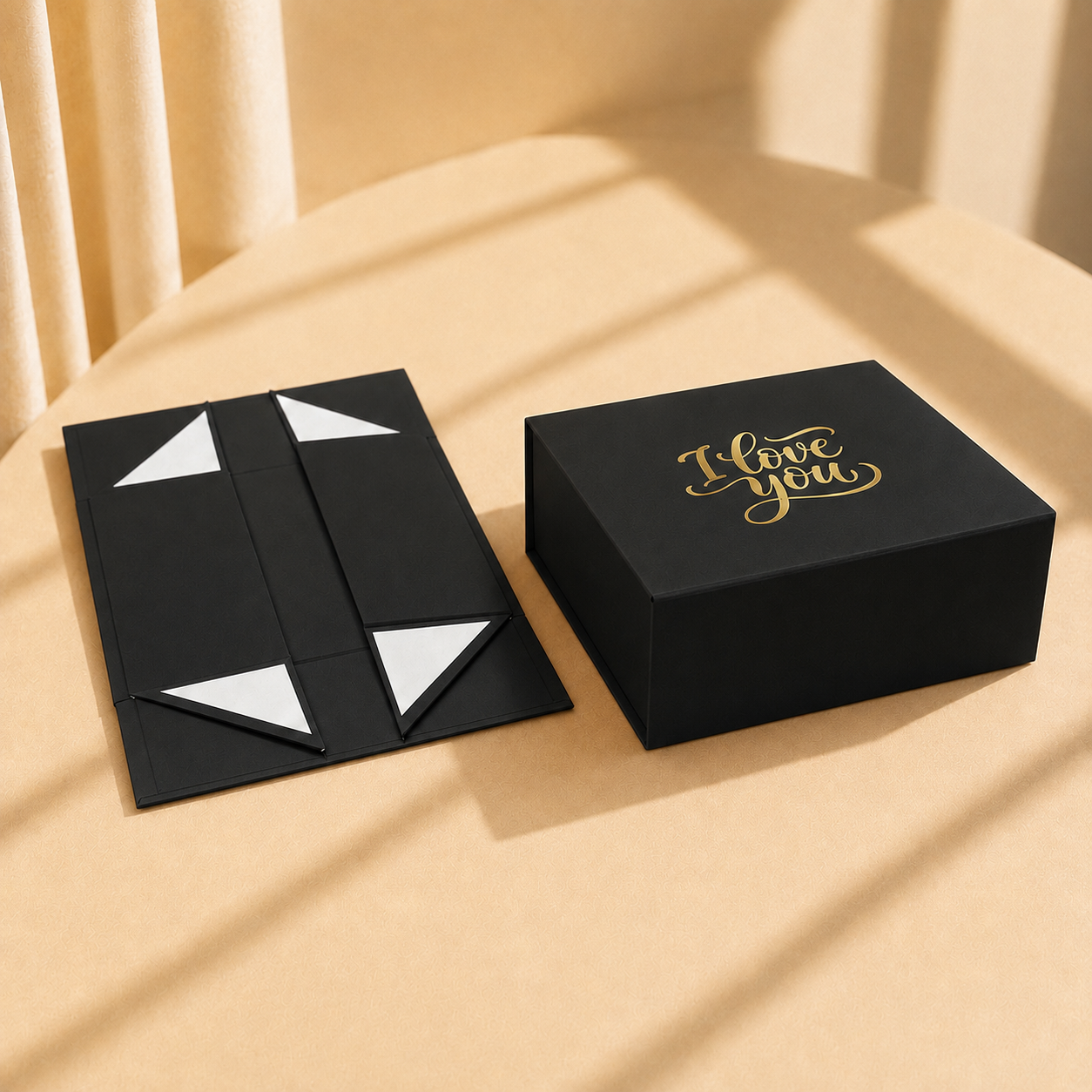 Black magnetic folding gift box with gold foil "I Love You" print, shown flat-packed and assembled