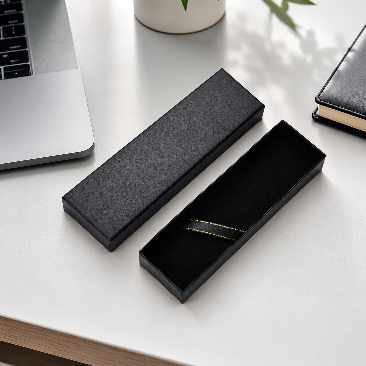 Black pen gift box with empty foam insert and removable lid