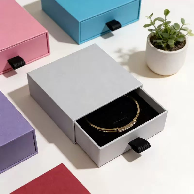Custom sliding drawer gift box with ribbon pull and fitted insert