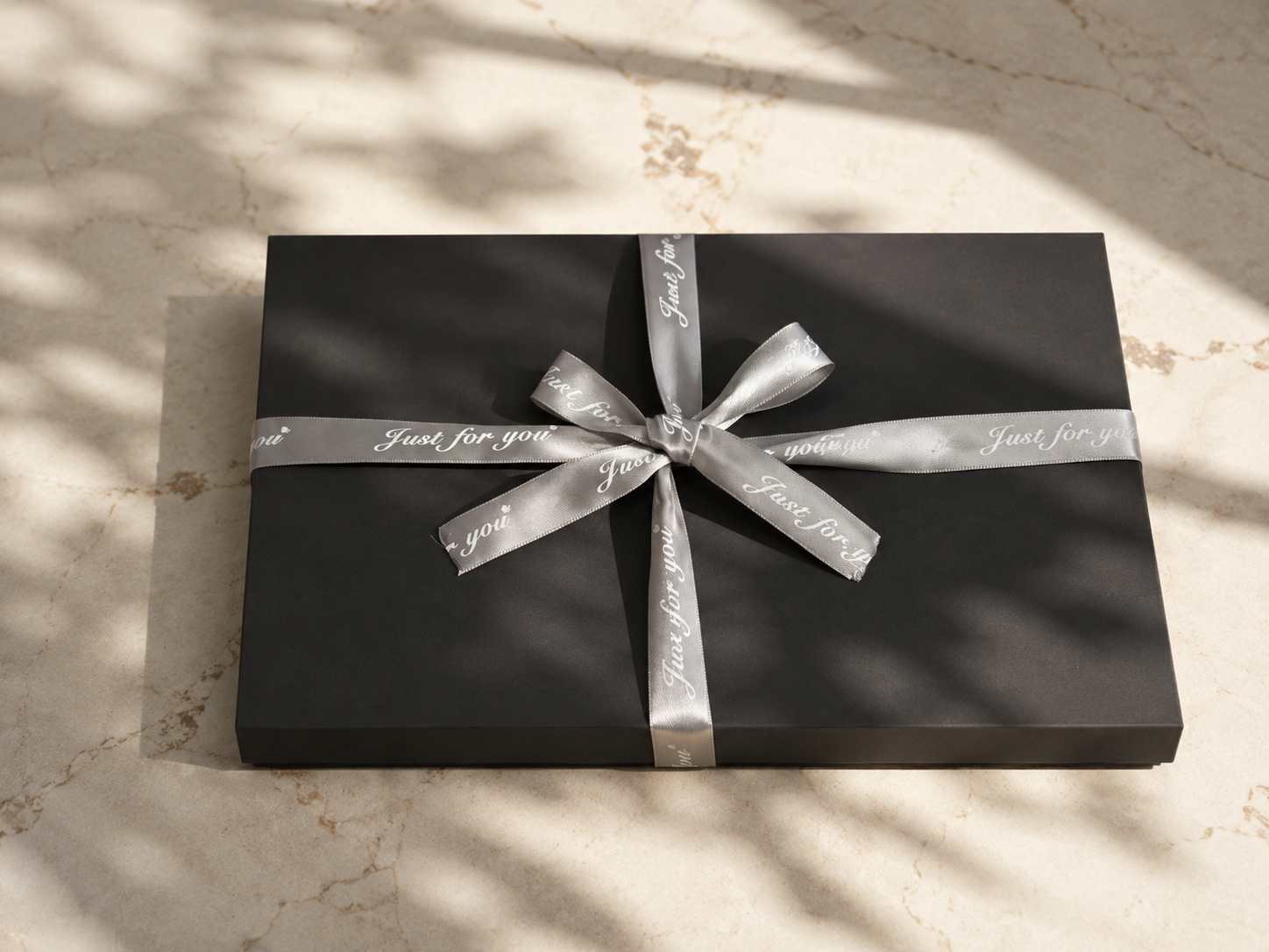 Unboxing presentation of a high-end gray cardboard gift box with soft interior lining padding, designed for high-end stationery and tech gadget packaging.
