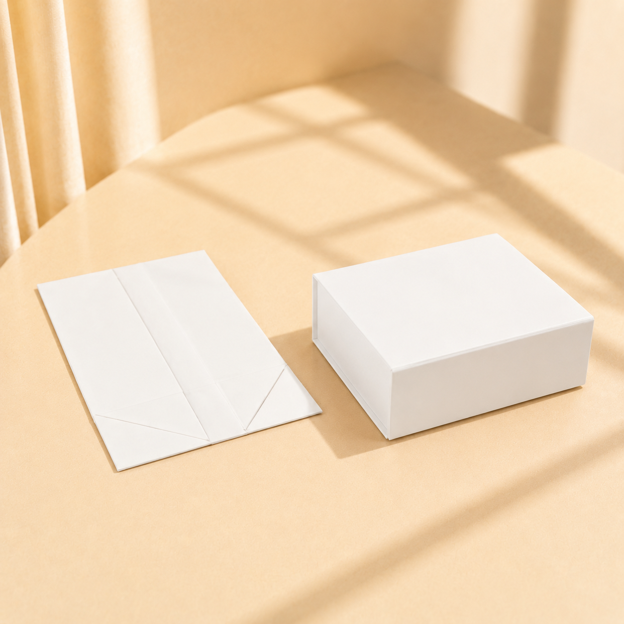 White collapsible magnetic gift box shown closed and flat